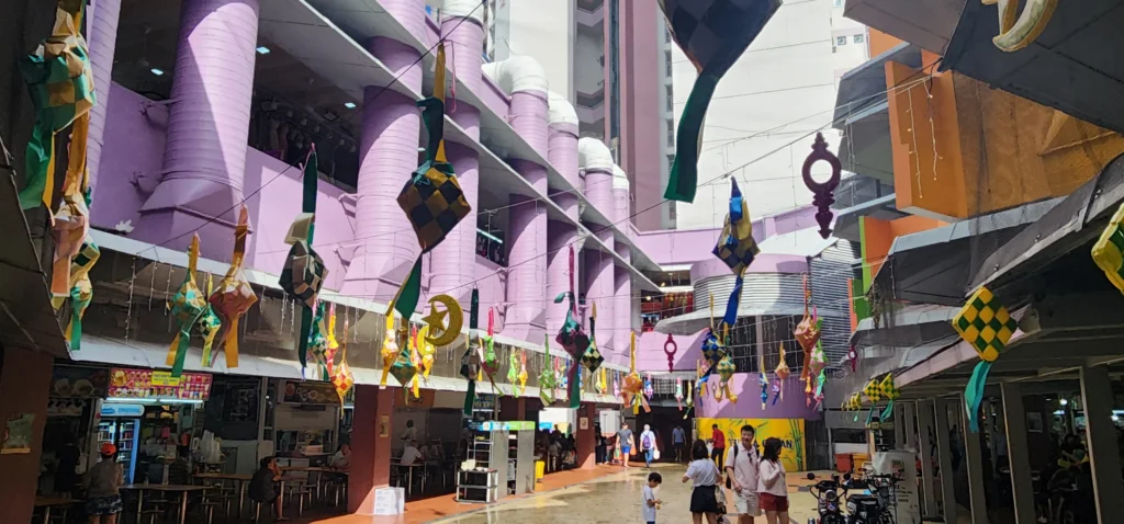 Festive decorations hanging above the walkway inside Tekka Centre in Singapore