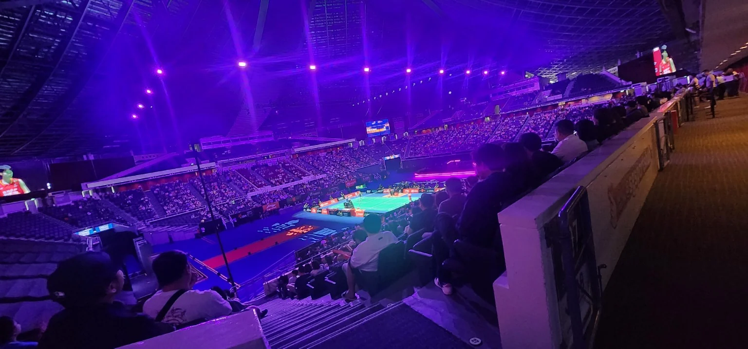 Spectators watching a badminton match inside the Singapore Indoor Stadium during the KFF Singapore Badminton Open 2026