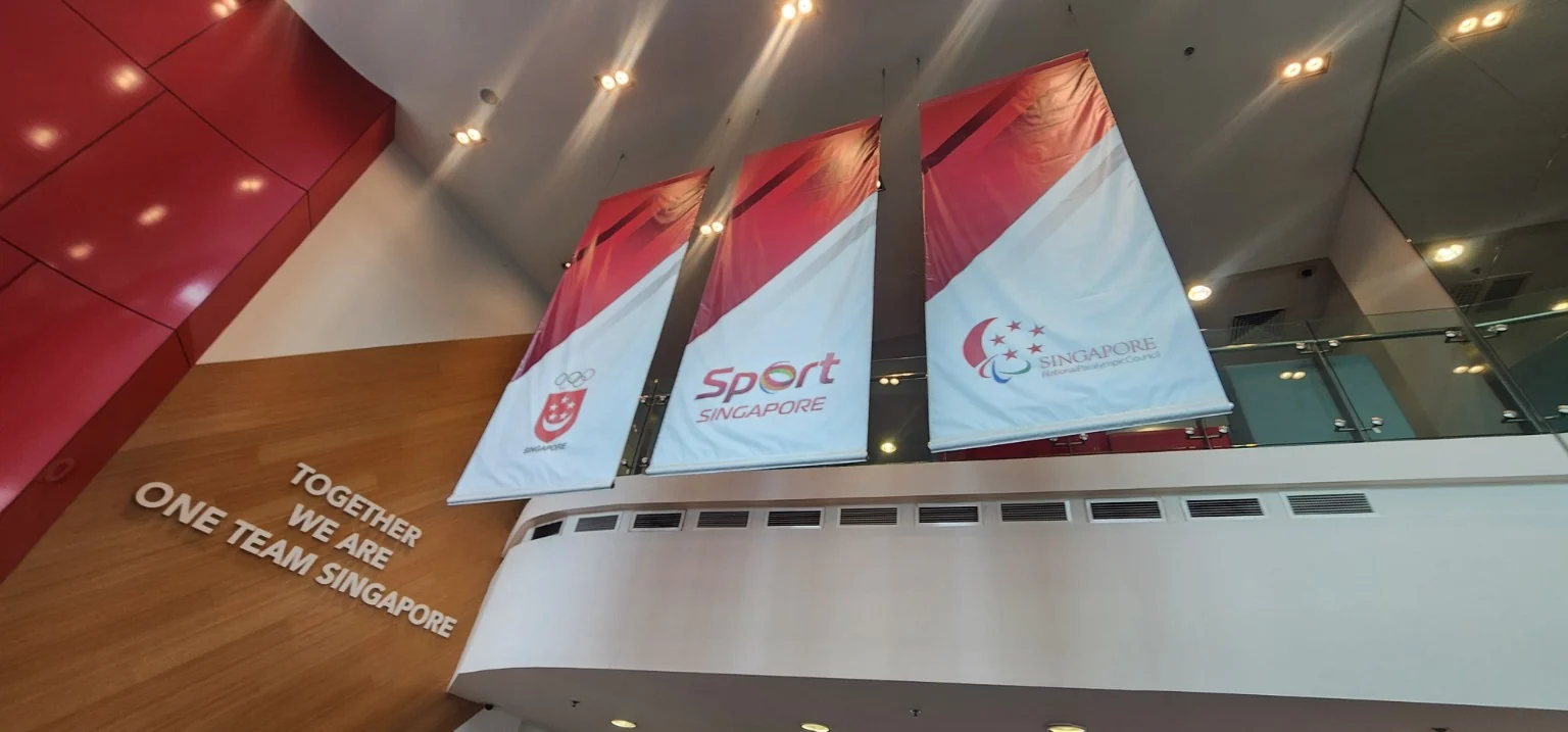 Sport Singapore, Team Singapore and Singapore National Paralympic Council banners inside the sporting venue