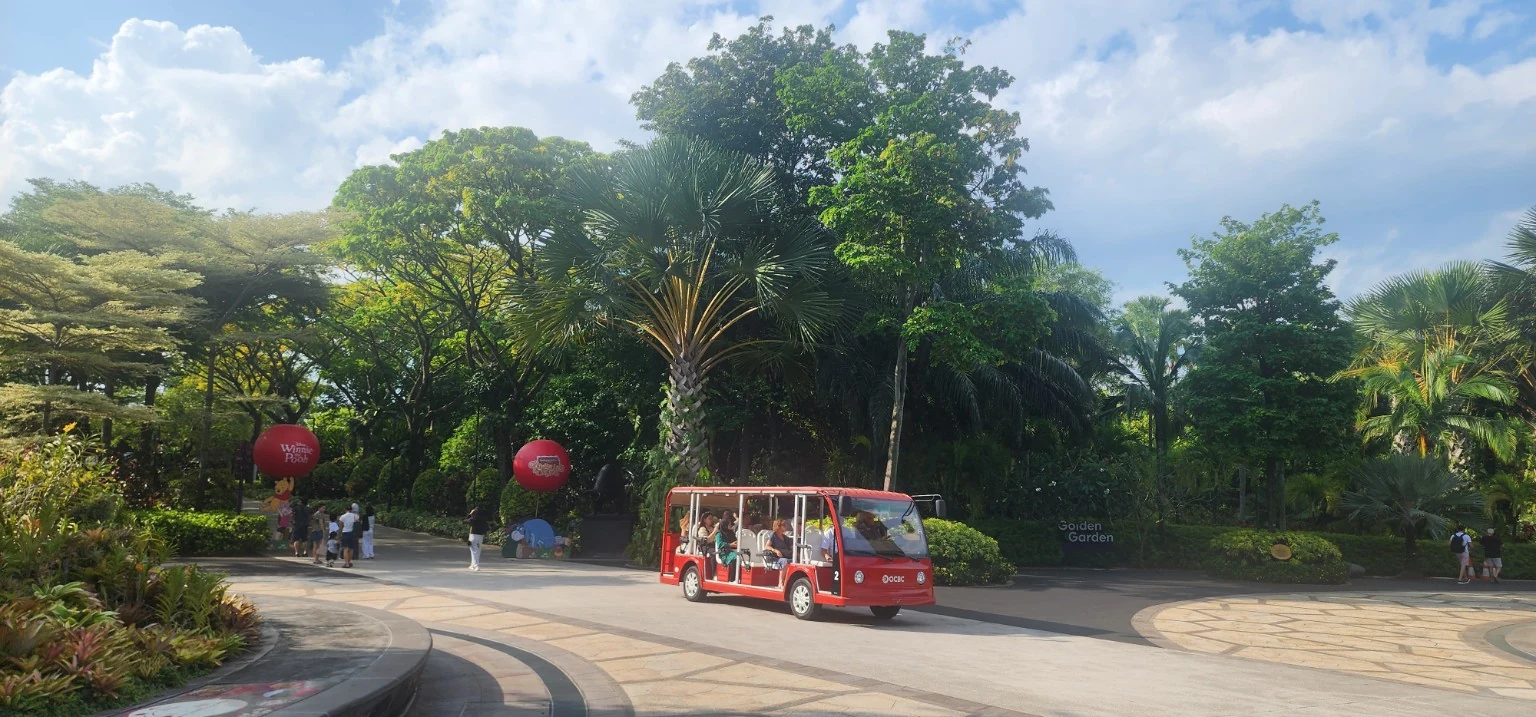 Arrival scene with red tram at Gardens by the Bay Singapore