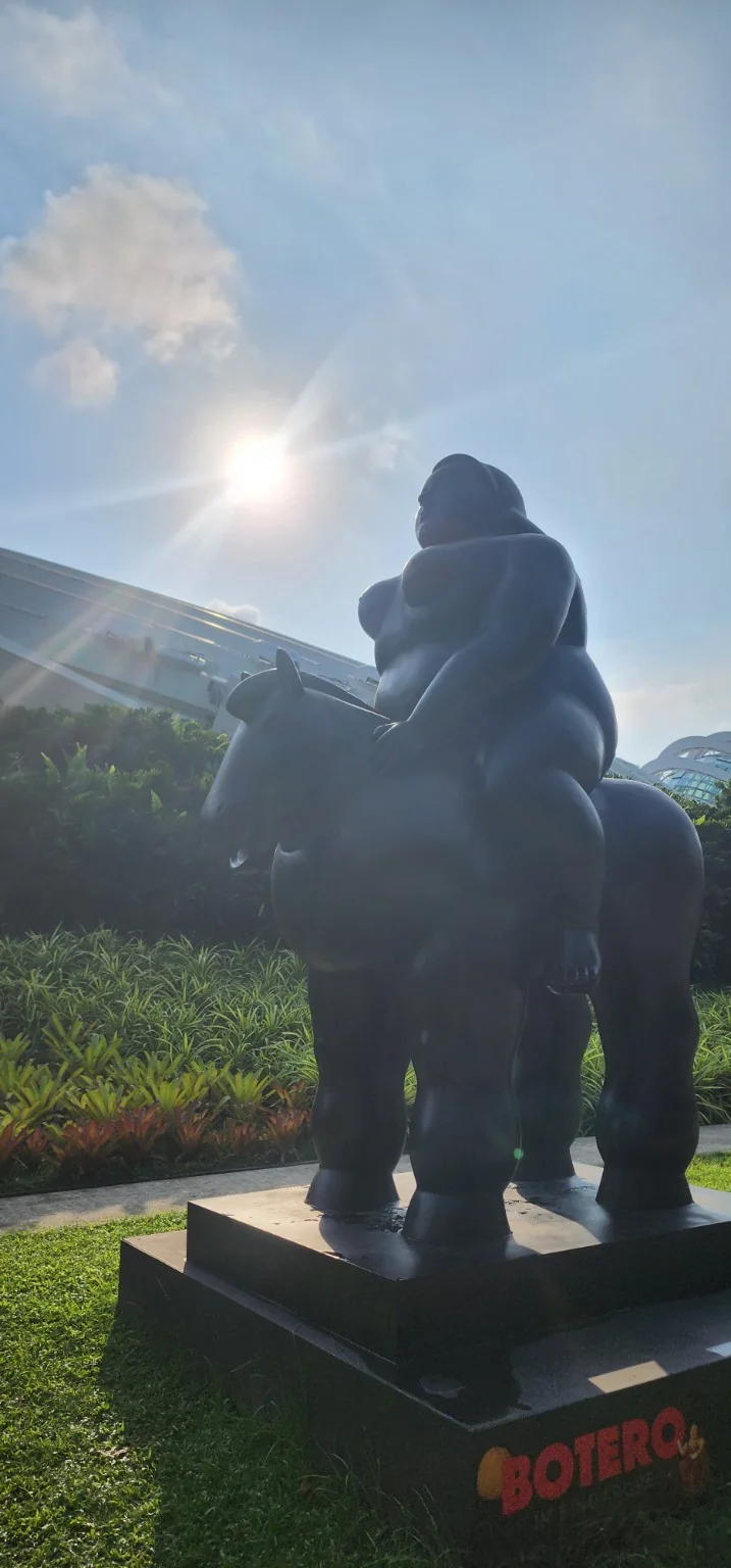 Rounded monumental sculpture by Fernando Botero at Gardens by the Bay