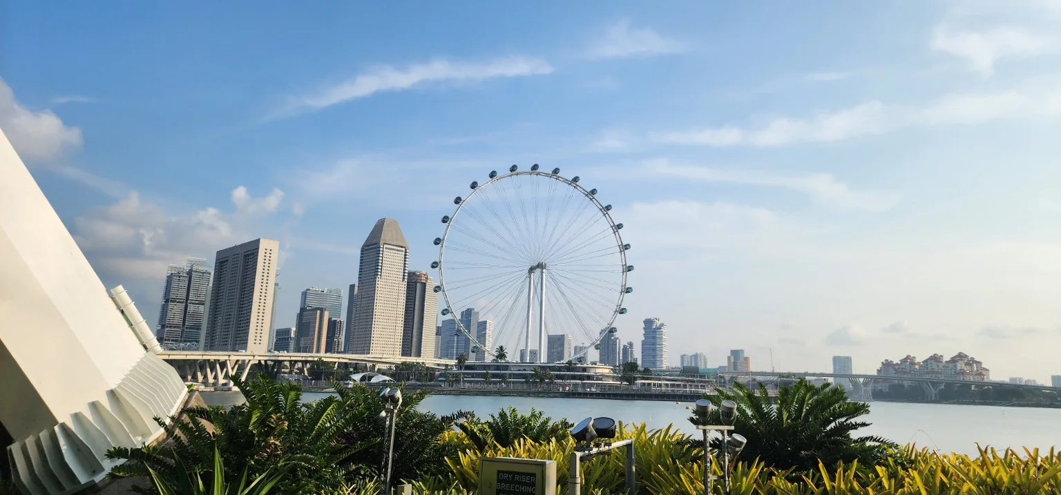 Singapore Flyer and Marina Bay skyline viewed during a clear morning